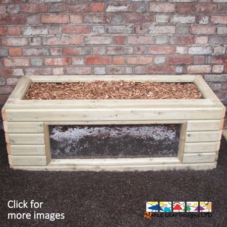 We can manufacture the Mini Beast Planter in any size to suit your space. The Mini Beast Planter in the main image is 1.6m x 0.6m x 0.6m, a popular size amongst customers. This planter is half-filled with screen soil and topped with woodchip; it also features a polycarbonate viewing window so that children can spectate the creatures within the soil. Children can investigate different species of insect that inhabit the soil, or, they can observe root systems from various plants - a great way to bring lessons into the great outdoors. 