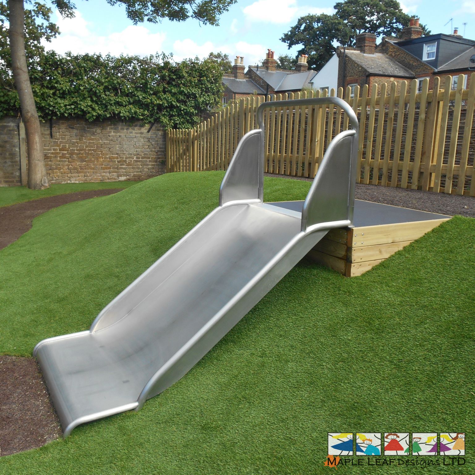 Embankment Slide by Maple Leaf Designs. The OneStop Playground