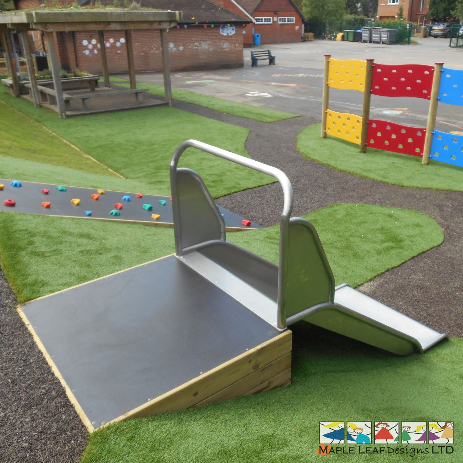Embankment Slide by Maple Leaf Designs. The OneStop Playground