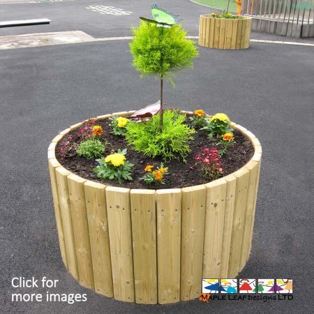 Our timber Circular Planters are an ideal way to bring greenery into your playground, while keeping it neatly contained. The timber slat construction can be made to suit any size, and the base of the planter is open to allow for drainage, preventing rot. All of our planters are installed with screened soil and can be planted if desired.