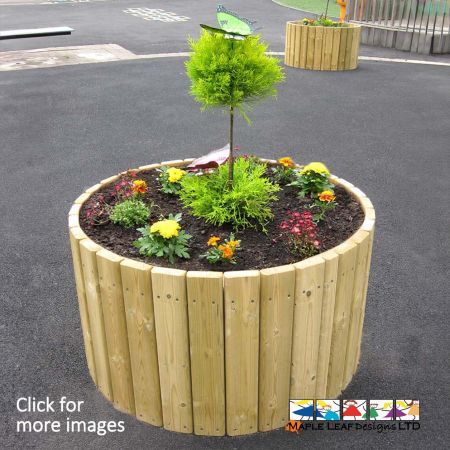 Our timber Circular Planters are an ideal way to bring greenery into your playground, while keeping it neatly contained.  The timber slat construction can be made to suit any size, and the base of the planter is open to allow for drainage, preventing rot.  All of our planters are installed with screened soil and can be planted if desired.
