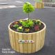 Our timber Circular Planters are an ideal way to bring greenery into your playground, while keeping it neatly contained.  The timber slat construction can be made to suit any size, and the base of the planter is open to allow for drainage, preventing rot.  All of our planters are installed with screened soil and can be planted if desired.