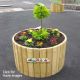 Our timber Circular Planters are an ideal way to bring greenery into your playground, while keeping it neatly contained. The timber slat construction can be made to suit any size, and the base of the planter is open to allow for drainage, preventing rot. All of our planters are installed with screened soil and can be planted if desired.