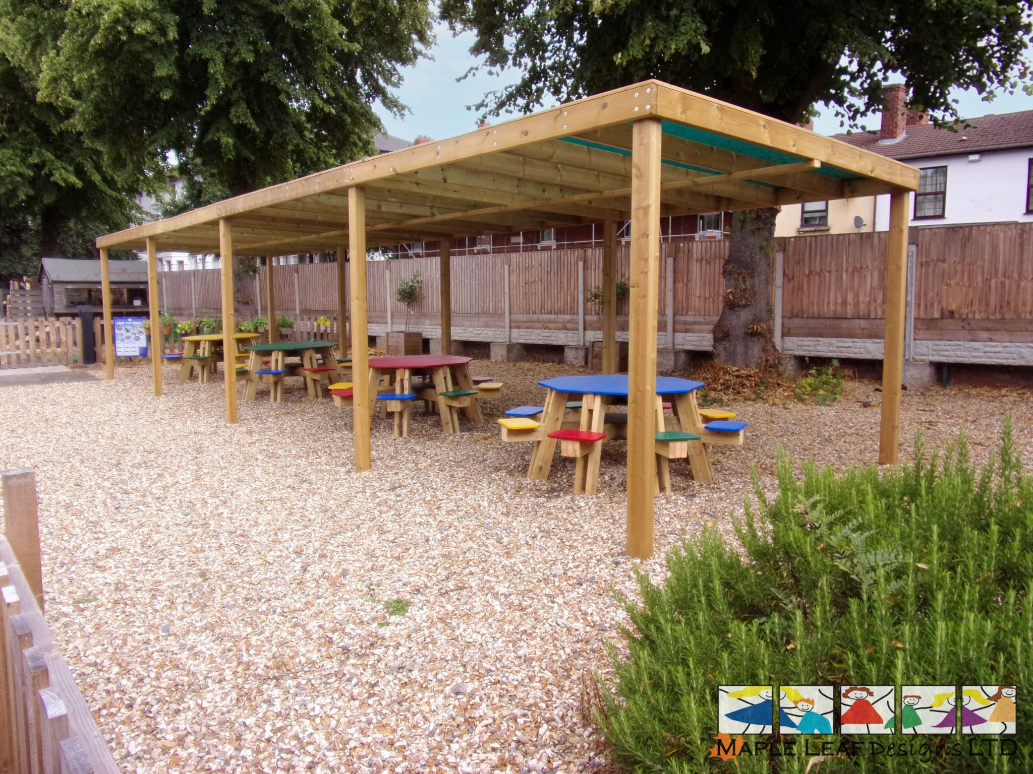 Timber Pergola with Green Mesh Roof by Maple Leaf Designs. The OneStop
