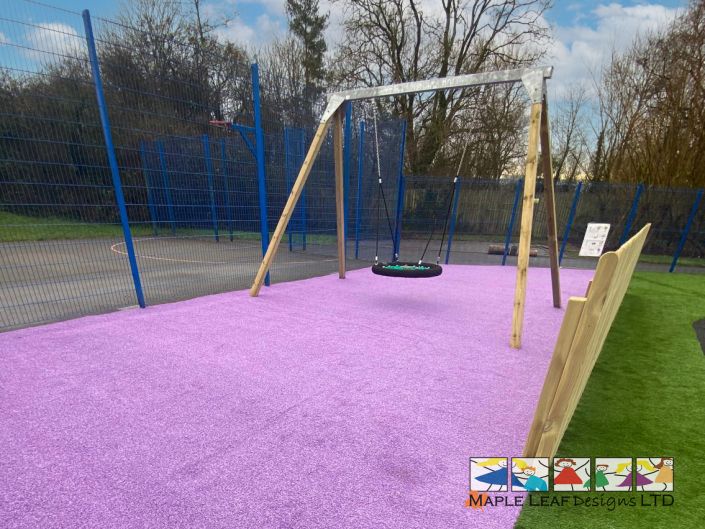 Birds Nest Swing Purple Artificial Grass 1 – Brookfields Hallwood Park Dec 2024