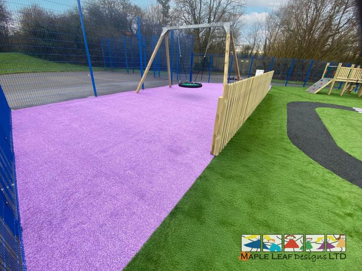 Birds Nest Swing Purple Artificial Grass 2 – Brookfields Hallwood Park Dec 2024